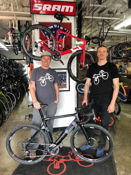 Pony Shop staff posing with 3T bike